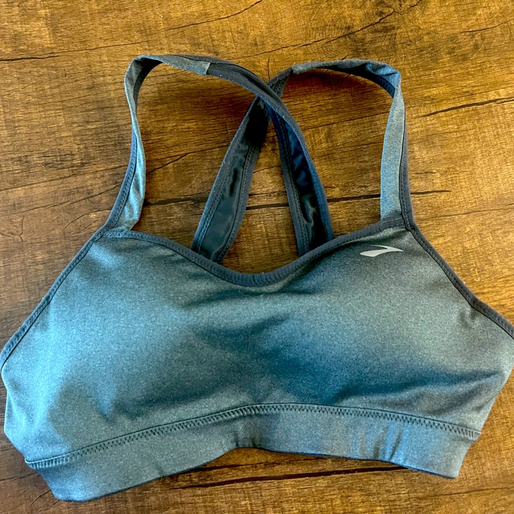 Sports bra with sewn in pads